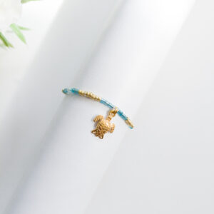 Turtle gold/aqua armband
